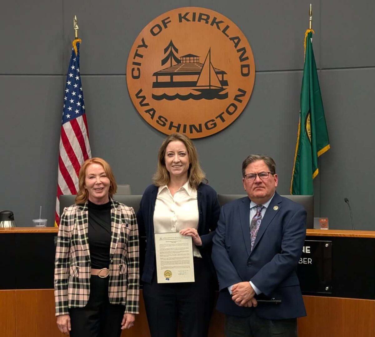 KCSARC board member accepts a Sexual Assault Awareness Month Proclamation from the city of Kirkland.
