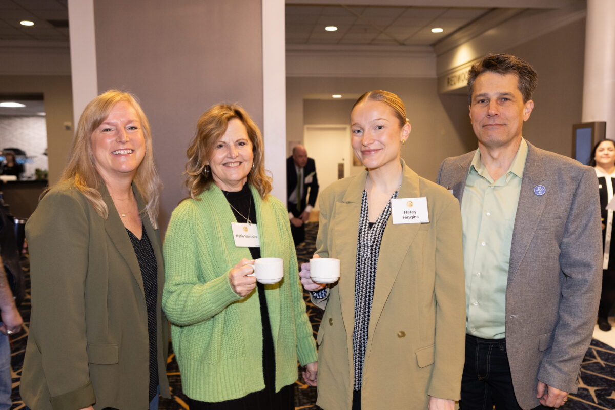 Group of people pose at KCSARC fundraising event.